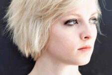 a side-parted choppy blond bob works great for women with round faces, giving a bit of an edge