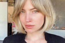 an elegant blonde short bob with curtain bangs is a lovely and chic idea to rock anytime