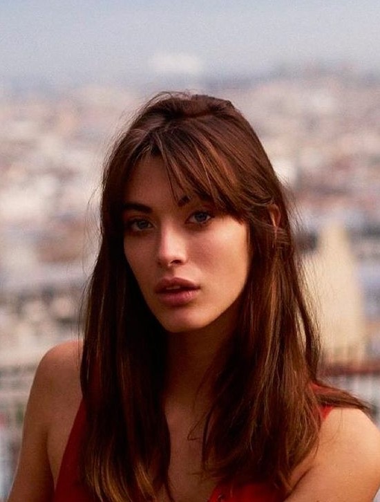long dark hair with curtain bangs and texture is a lovely idea to look up-to-date and bold
