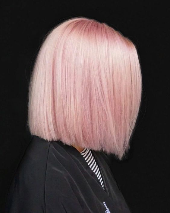 a beautiful and lovely light pink straight long bob with shiny and chic hair is amazing to make a statement