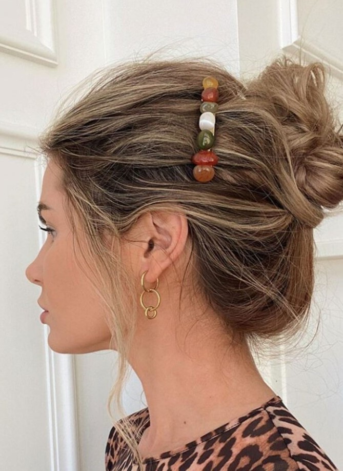a messy high bun with a messy top and some locks down plus a hair accessory is a good idea, you may add volume with dry shampoo