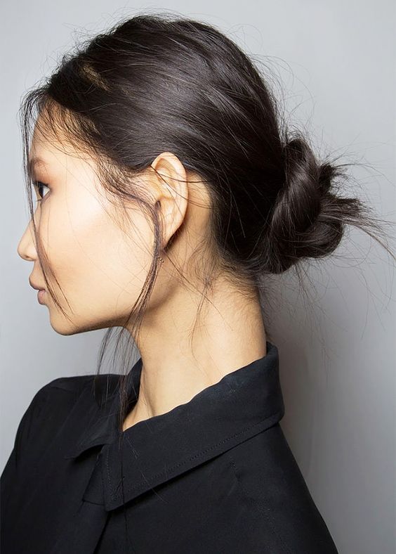 a messy twisted low bun with a bit of mess on top is a great idea for a bad hair day, and it will keep it in place