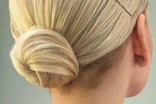 09 a slick low bun with a perfectly sleek top is a great idea of an office hairstyle or when you wanna look a bit more formal