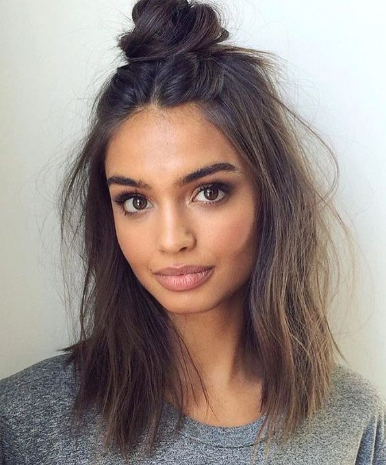 a super messy top knot and some hair down are a perfect combo for a bad hair day, get this volume with dry shampoo
