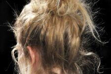 13 a super mess top knot with a lot of textured hair down is always a good idea that can be realized on the go