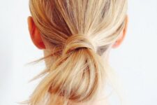 14 a wrapped low bun is a cool take on a usual low bun, use part of your hair to wrap around