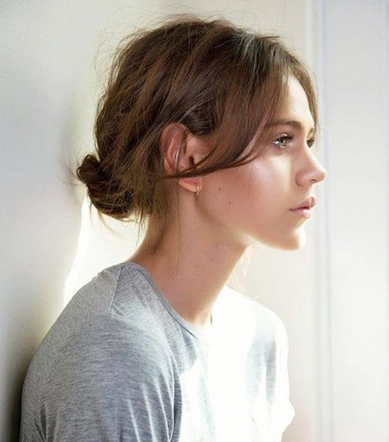 an easy and fast messy low bun with a messy volume on top is a cool idea for a bad hair day