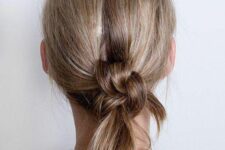 19 a messy braids knot updo with a bit of volume on top is a chic and cool idea to rock, you can make it with medium or long hair