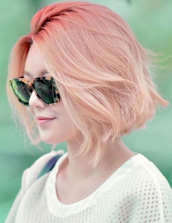a hot to light and pale pink ombre chin length bob with a lot of volume is a gorgeous idea to try