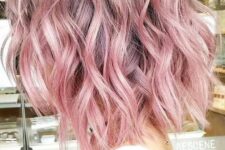 24 a lob haircut with waves done in pastel pink, with a darker root, looks great and chic