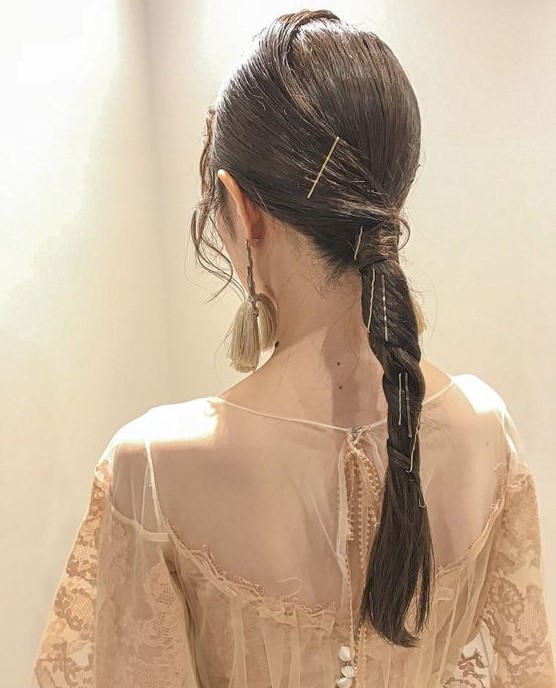 a twisted low ponytail seems to be from an haute couture catwalk, and you can wear it on a bad hair day