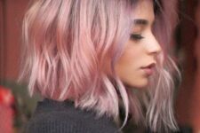 27 a short wavy bob with a dark purple root and pastel pink hair is a lovely idea if you wanna rock a classic haircut