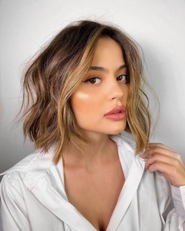 a beautiful brown bob with blonde balayage and face-framing locks, with messy texture is a lovely idea