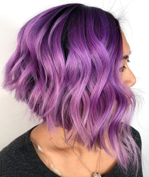 a beautiful lavender angled bob with a darker root and waves is a stylisha dn catchy idea with geometry and texture