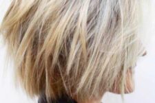 a blonde feathered bob with layers and balayage is a fresh and modern idea to rock