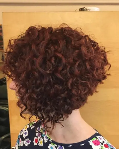 a bold dark ginger A-line bob is a classic idea that always works and it's easy to control this thick hair with such a cut