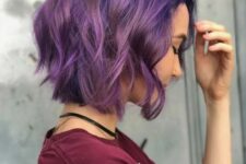 a bold purple midi bob with a navy root and waves is a stylish and catchy idea to rock, it looks pretty nice