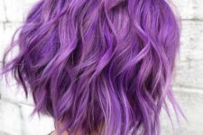 a bright and catchy purple wavy long bob with a lot of volume and texture is a stylish and bright idea to try