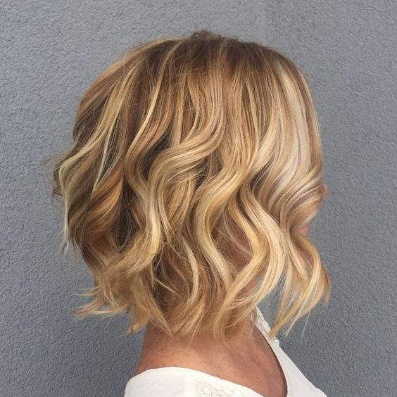 a bronde curly choppy long bob with gold blonde balayage is a lovely and catchy idea to rock