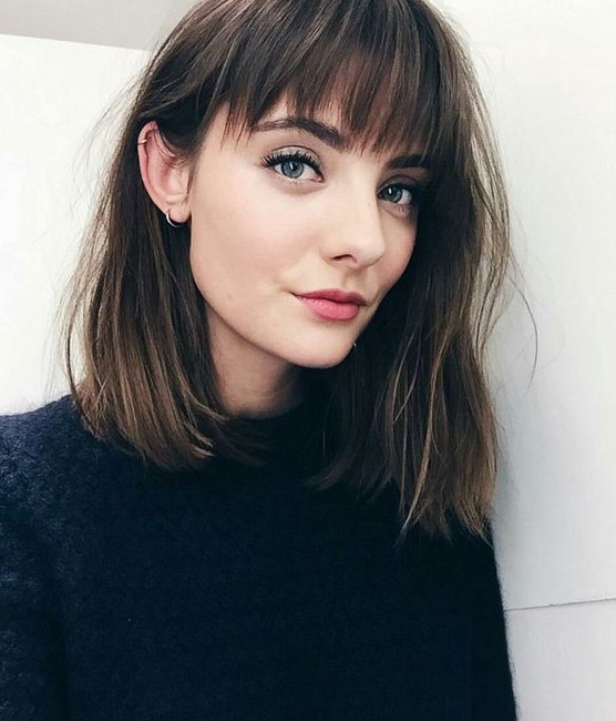 a chic brown outgrown bob with highlights and chic messy Birkin bangs is a very cute and lovely idea to rock anytime