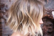 a chic light brunette wavy bob with blonde ombre and money piece is a very fresh and modern idea