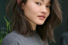 a cool textural and wavy outgrown bob with side part looks messy and effortlessly chic and cool