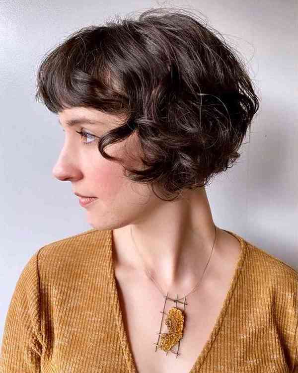 a curly French bob with soft, tousled curls is a lovely idea that looks sassy and cute
