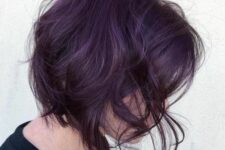 a deep purple messy textured wavy long bob with a lot of volume is a bold idea for the fall or winter