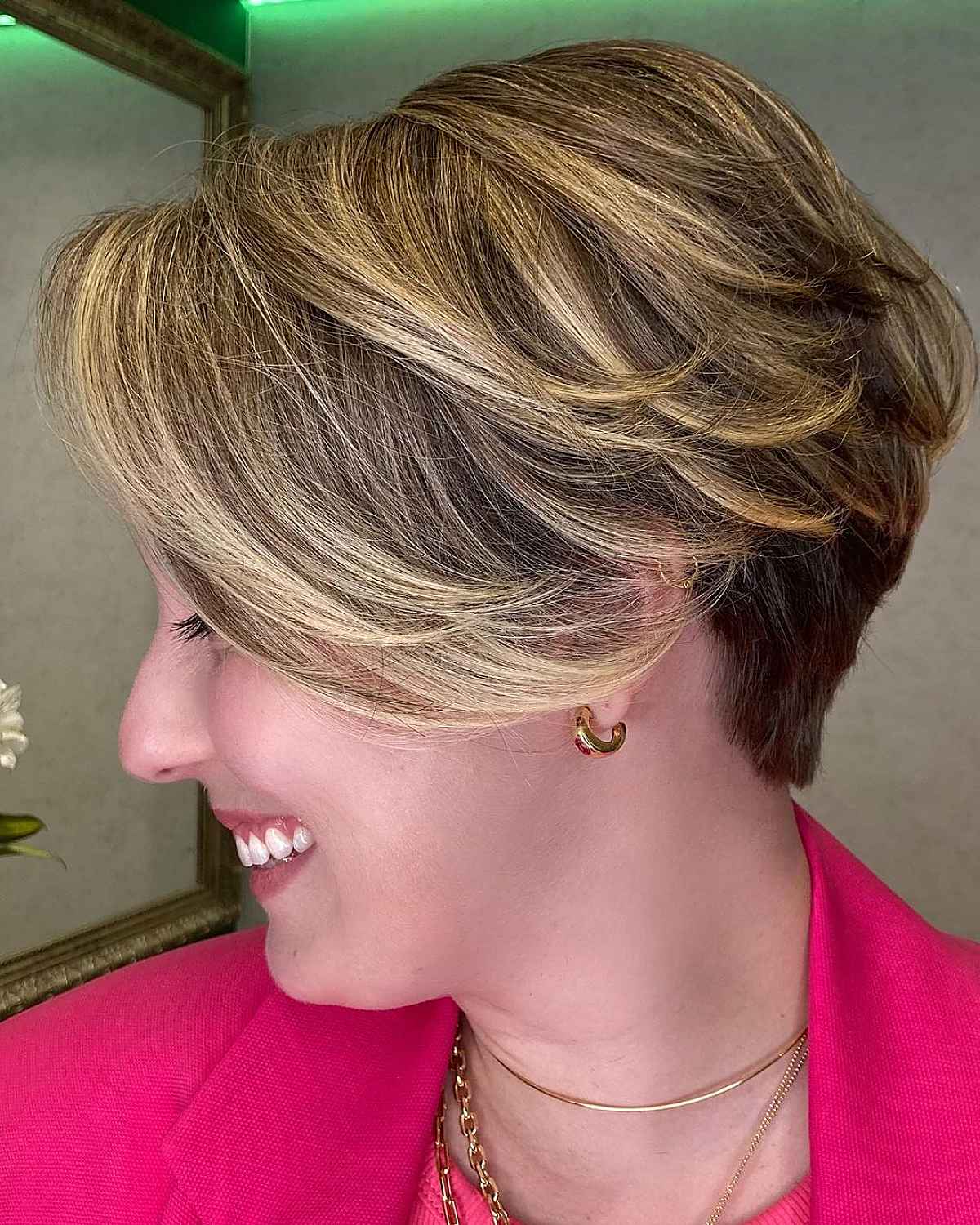 a feathered pixie bob with balayage highlights looks modern and fresh but will require manintenance and a blow dry