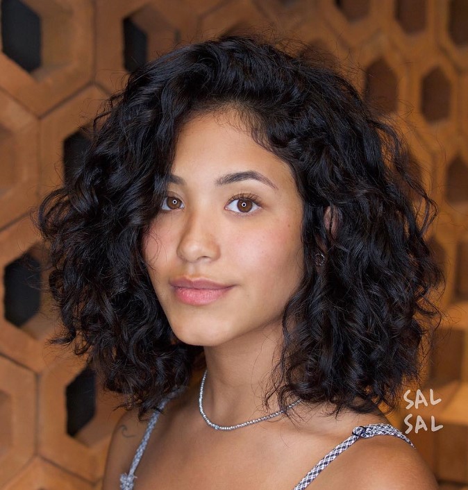 a gorgeous black curly outgrown bob with side part is an amazing idea for naturally curly hair