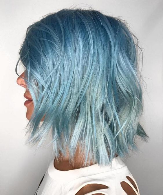a gorgeous light blue with an icy tone long bob with layers and messy texture is an ultimate idea for summer