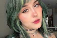a green octopus haircut with wispy bangs will have head turning wherever you go, here you can see lighter locks around the face