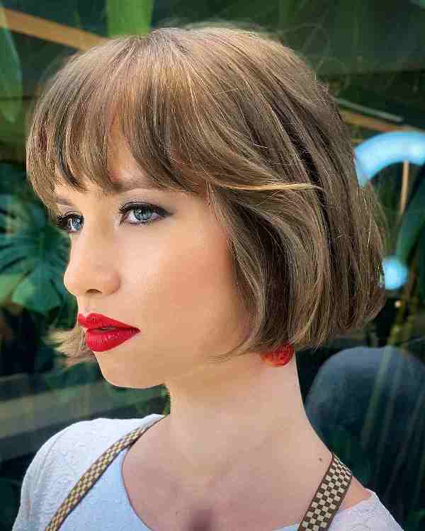 a jaw-length French bob with a fringe looks beautiful, and if you add layering, it will be light and fluffy