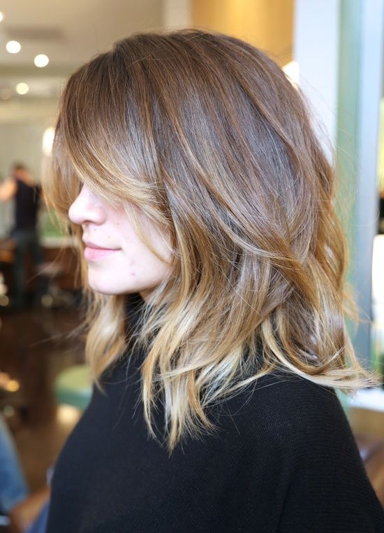 a light brunette long bob with blong balayage and money peice, curtain bans and layers is amazing