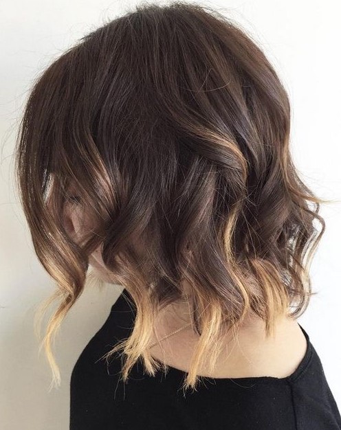 a long and wavy bob with blonde ombre touches and a lot of volume is a cool solution to spruce up your bob