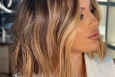 a long brunette bob with honey blonde balayage and a bit of waves is a chic and catchy idea with timeless elegance