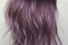 a messy wavy long bob in lavender is a catchy idea that brings color but looks delicate at the same time