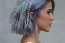 a pale blue choppy long bob with lilac locks and waves plus side part is a chic and bold idea