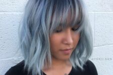 a pel blue layered long bob with wispy bangs and waves is a lovely idea if you are looking for a soft touch to your look