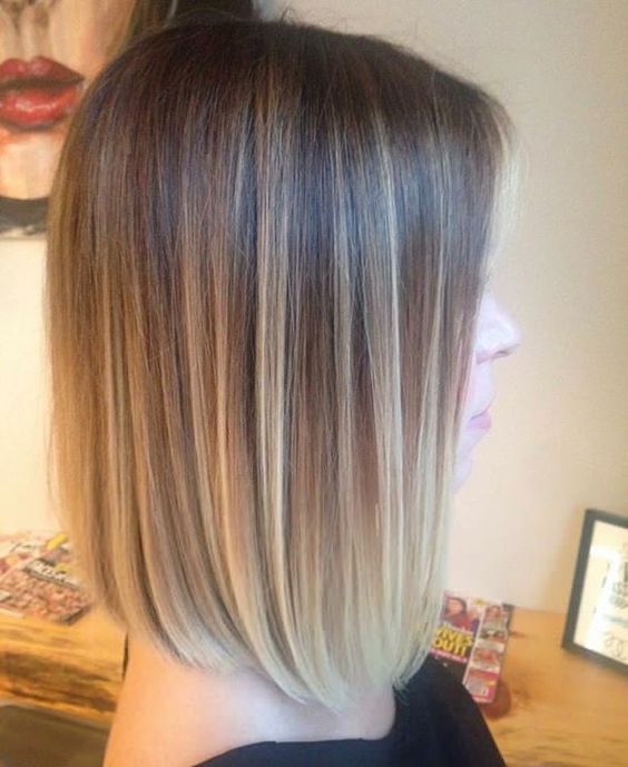 a pretty long ombre bob from light brunette to bleached blonde, with a lot of volume, is a catchy and cool idea