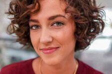 a short curly bob with square layers to maintain bouncy nature is a cool and chic idea