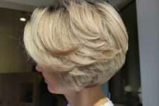 a short feathered bob haircut done in blonde is a cool idea if you want dimension for your hair