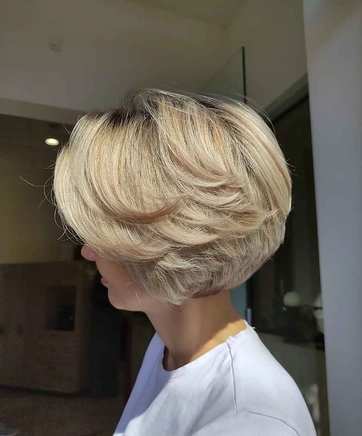 A short feathered bob haircut done in blonde is a cool idea if you want dimension for your hair