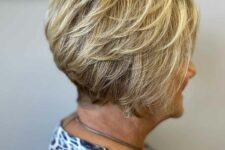 a short stacked bob with feathered layers will bring in some movement and is a perfect choice for fine hair