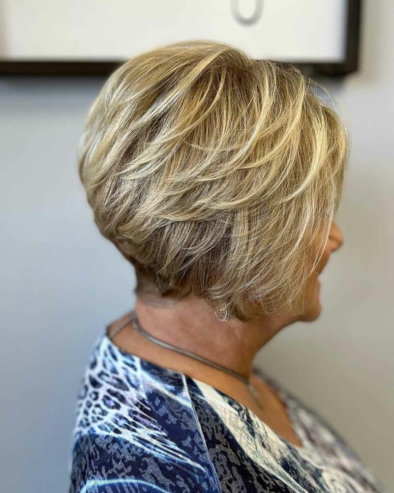 a short stacked bob with feathered layers will bring in some movement and is a perfect choice for fine hair