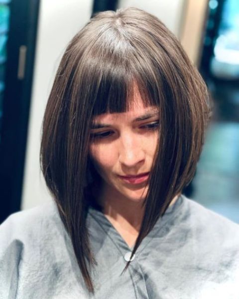 a shoulder-length blunt bob with blunt bangs is a modern and sleek idea, long straight hair looks spectacular