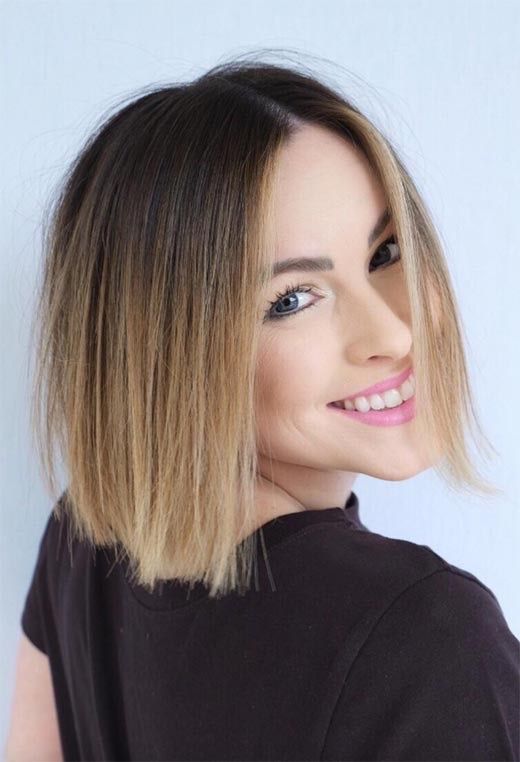 a stylish brunette bob with an ombre effect with a blonde shade and side part is a catchy and pretty idea