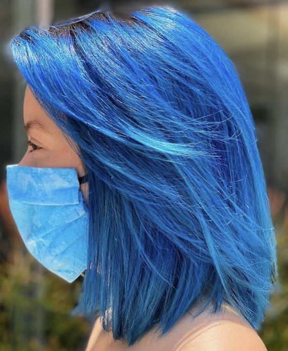a super bold blue long bob with side bangs and a darker root is an ultimate idea to try when you want some color