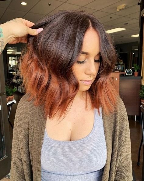 a volumetric long bob with an ombre effect, from dark brunette to copper and red, is amazing
