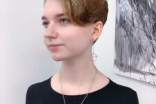 an asymmetrical wavy pixie cut to show off beautiful jawlines and creates a slimming effect to the side of the face